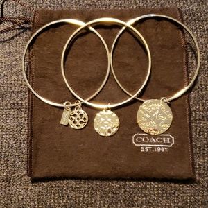 Coach stacking bracelets goldtone
